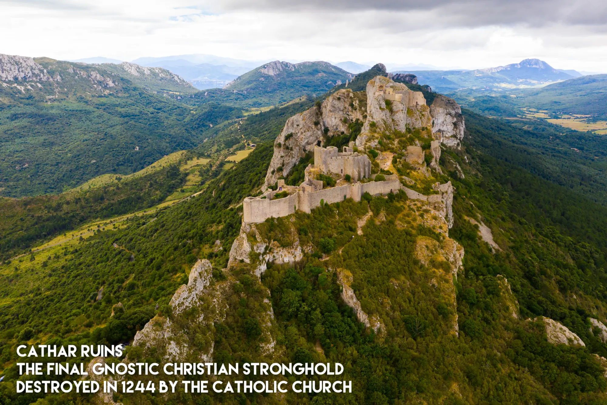 Ruins of Cathar castle of Peyrepertuse perched on rocky ridge. France